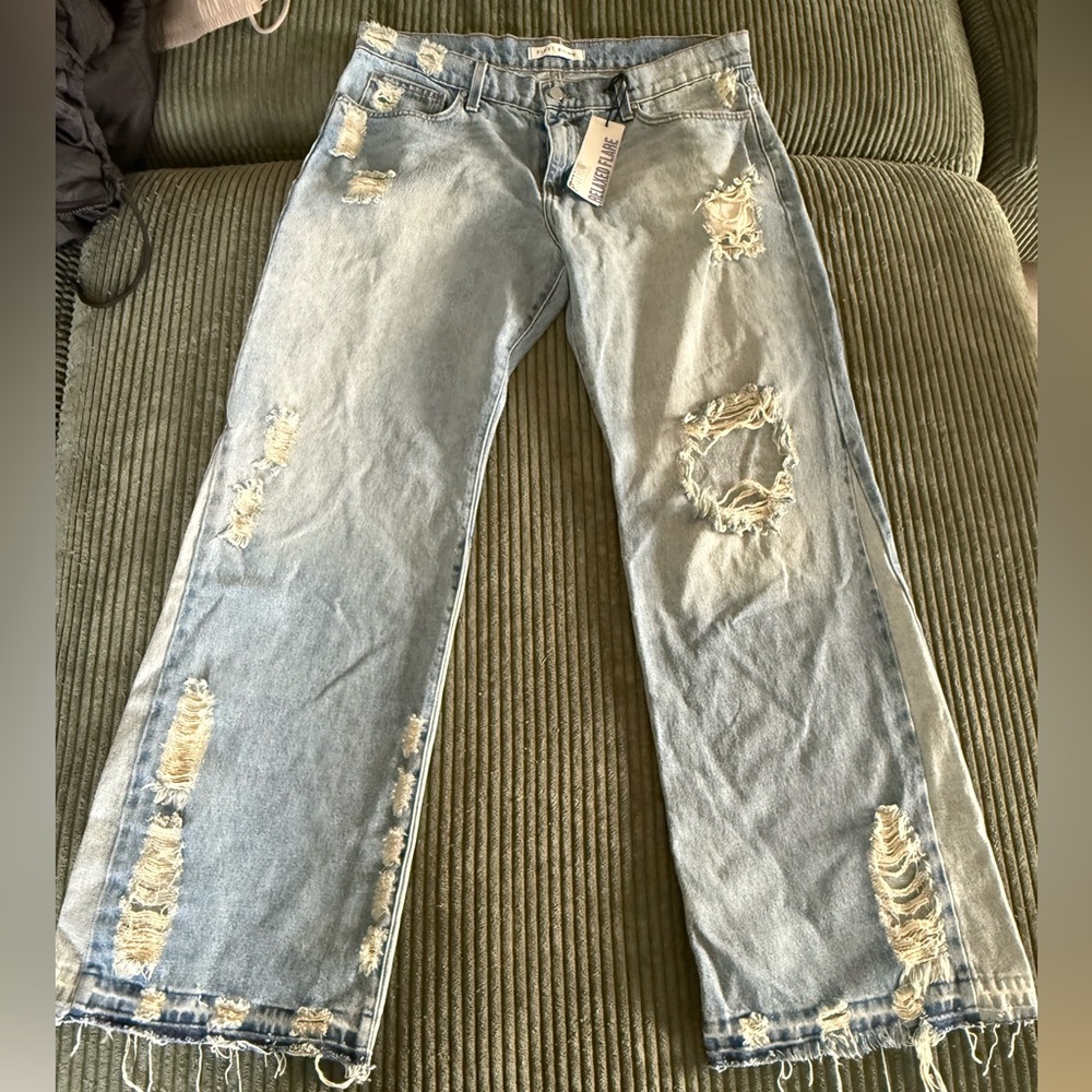 Distressed Light Blue Jeans